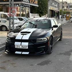 دۆج چارجەر